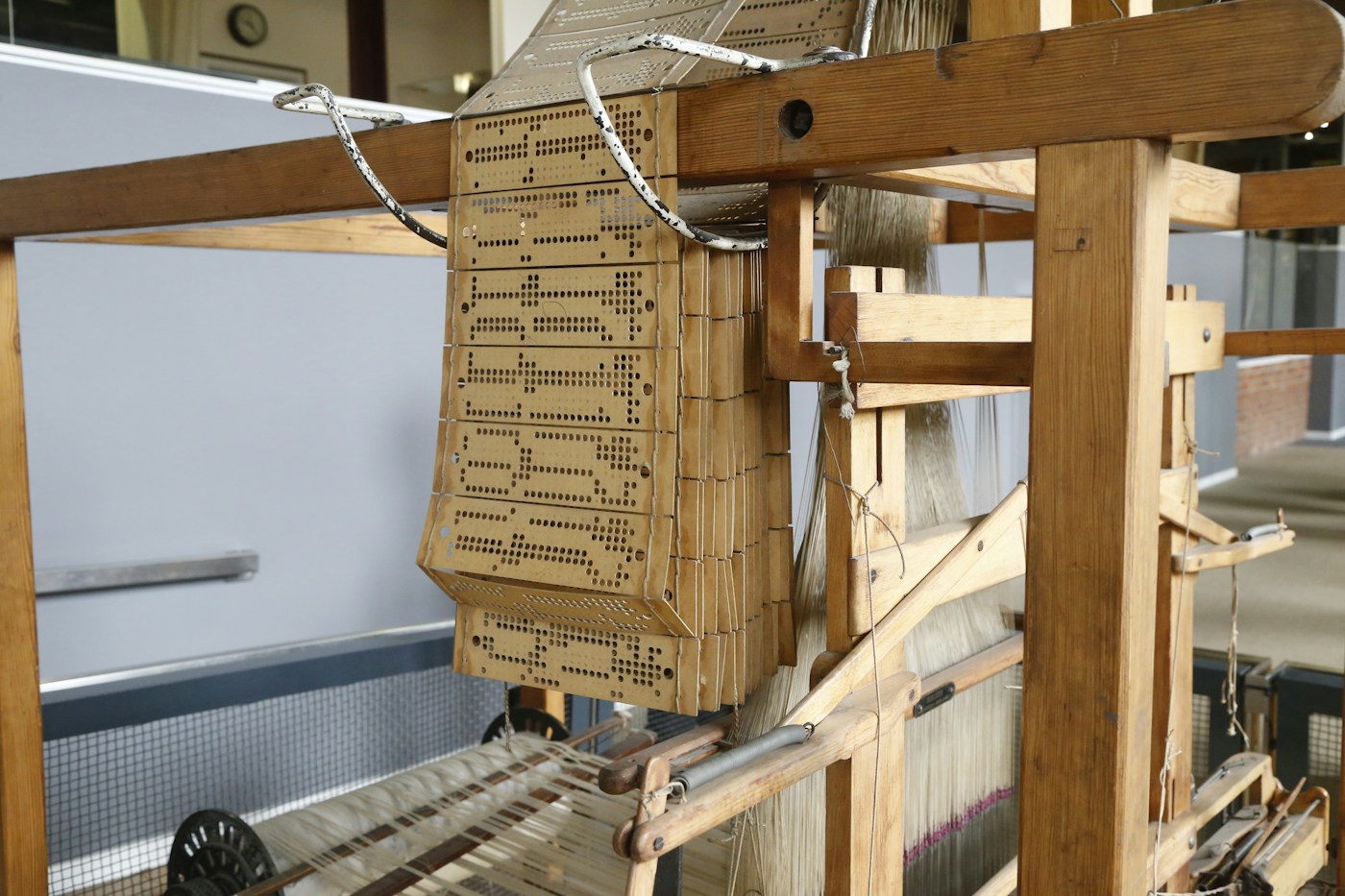 A Jacquard loom with its chain of punched cards, at the Museum of Science and Industry in Manchester